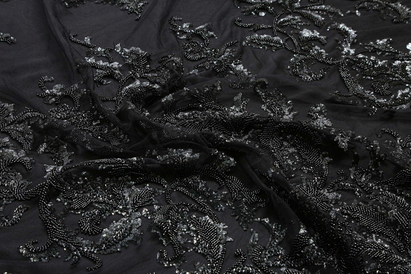 Tulle à petits motifs de toile d'araignée